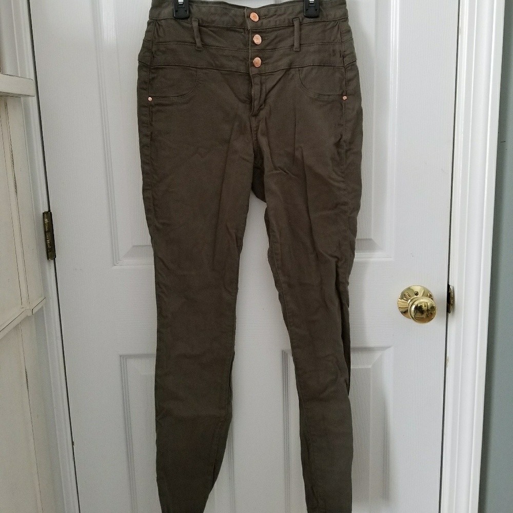 High-waisted green skinny jeans